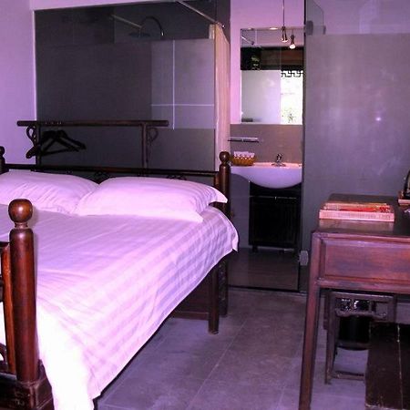 Yi (Anhui) XI Di Travel Lodge חדר תמונה